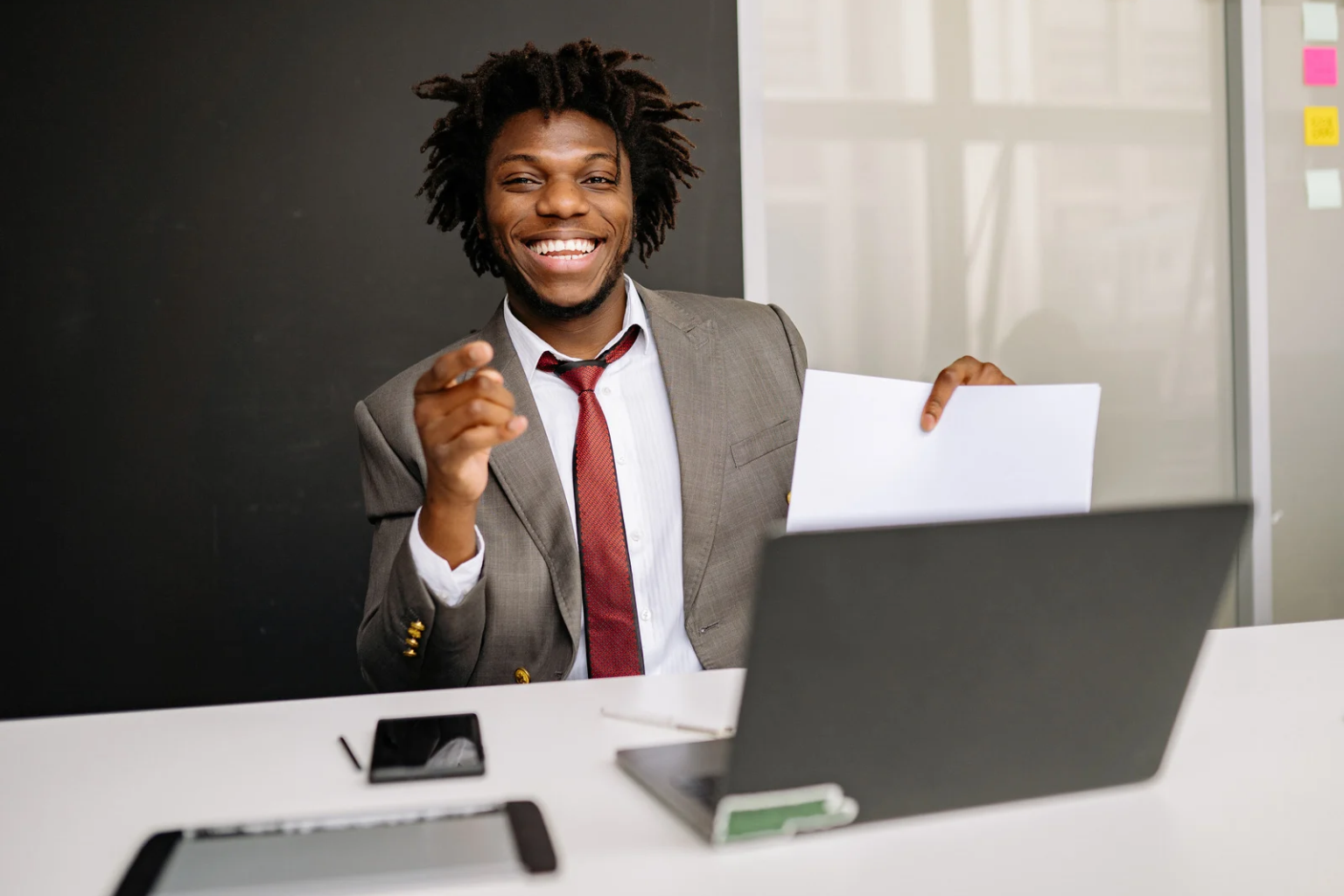 happy employee office paper computer